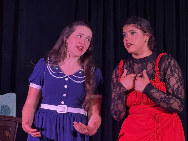 Two friends in conversation — Bye Bye Birdie, The JC Mainstage
